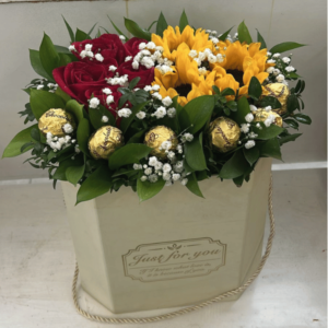 Box de rosas, girasoles y chocolate