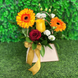 Cartera de gerberas y rosas